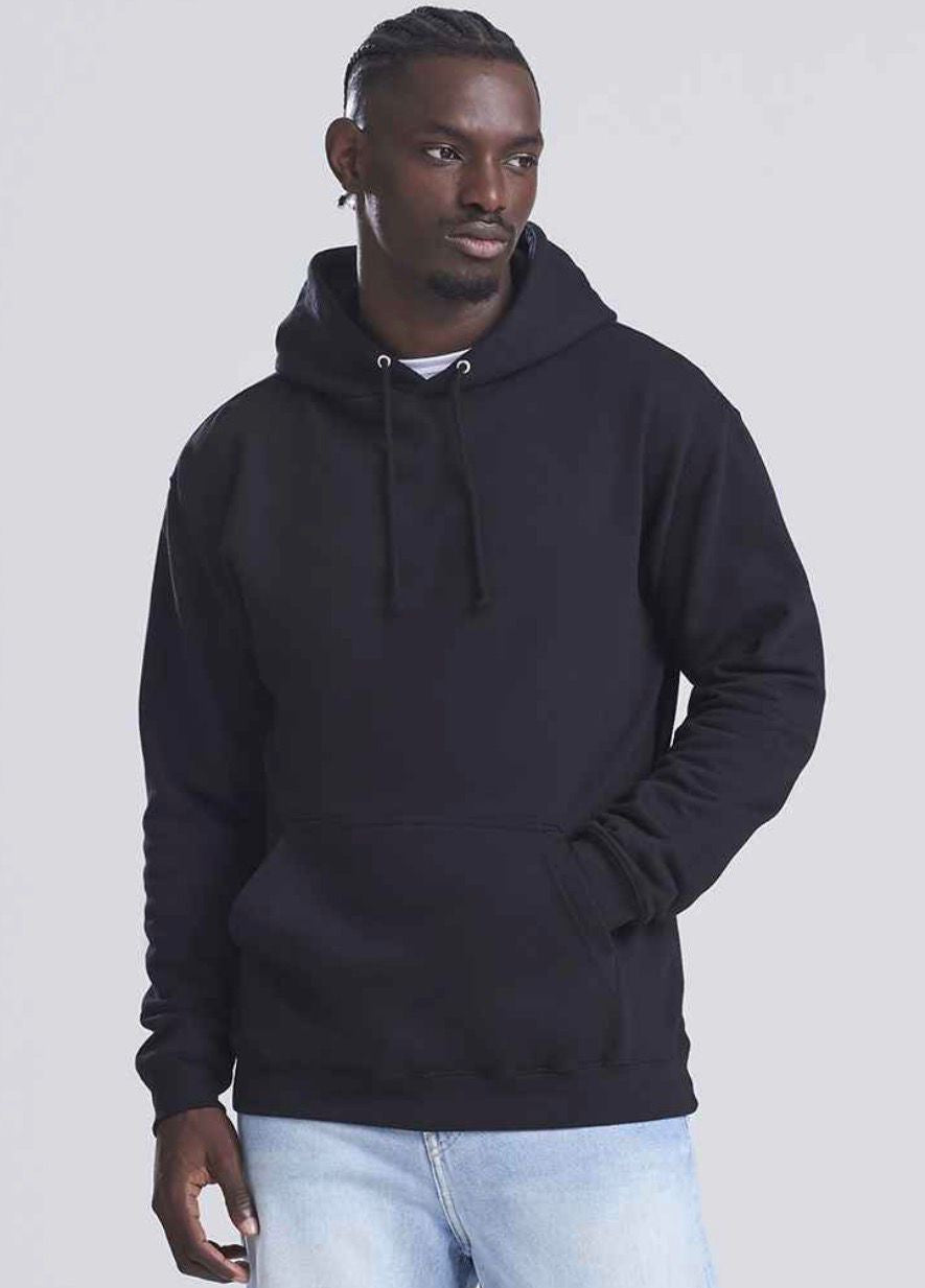 man wearing a black hoodie looking at the camera
