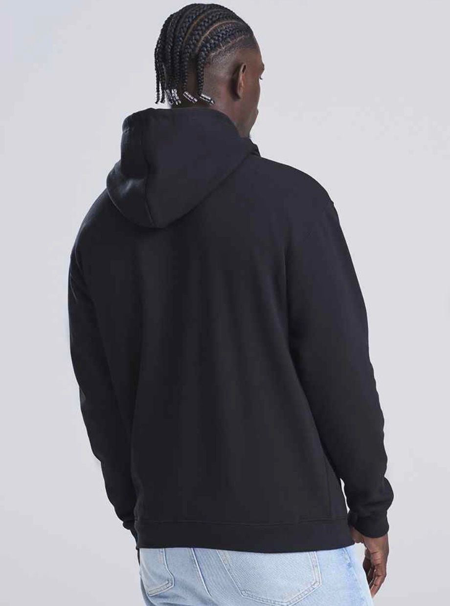 man wearing a black hoodie looking away from the camera