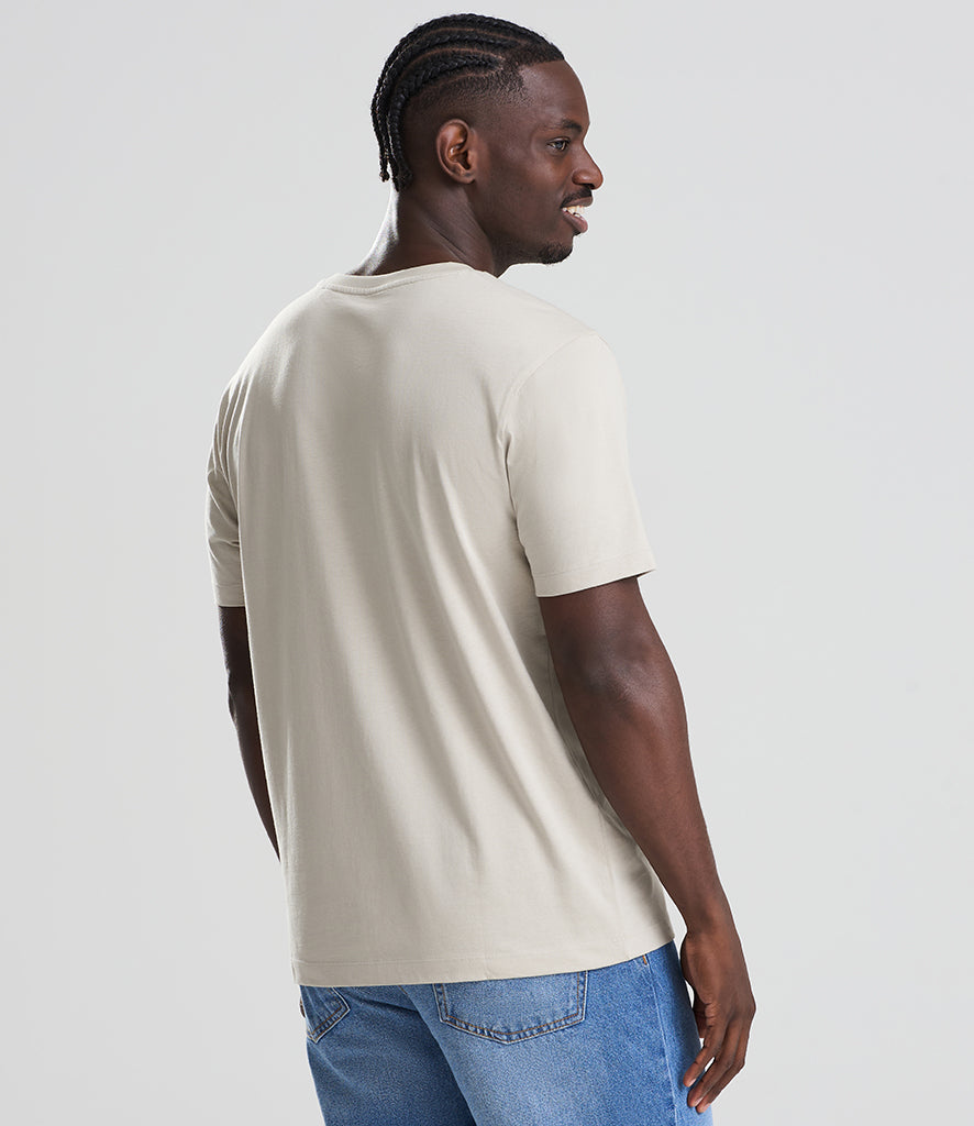 man in white shirt looking away from the screen