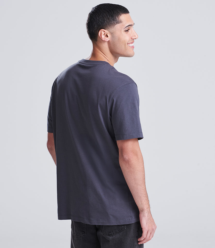 man in dark blue shirt facing away from the screen