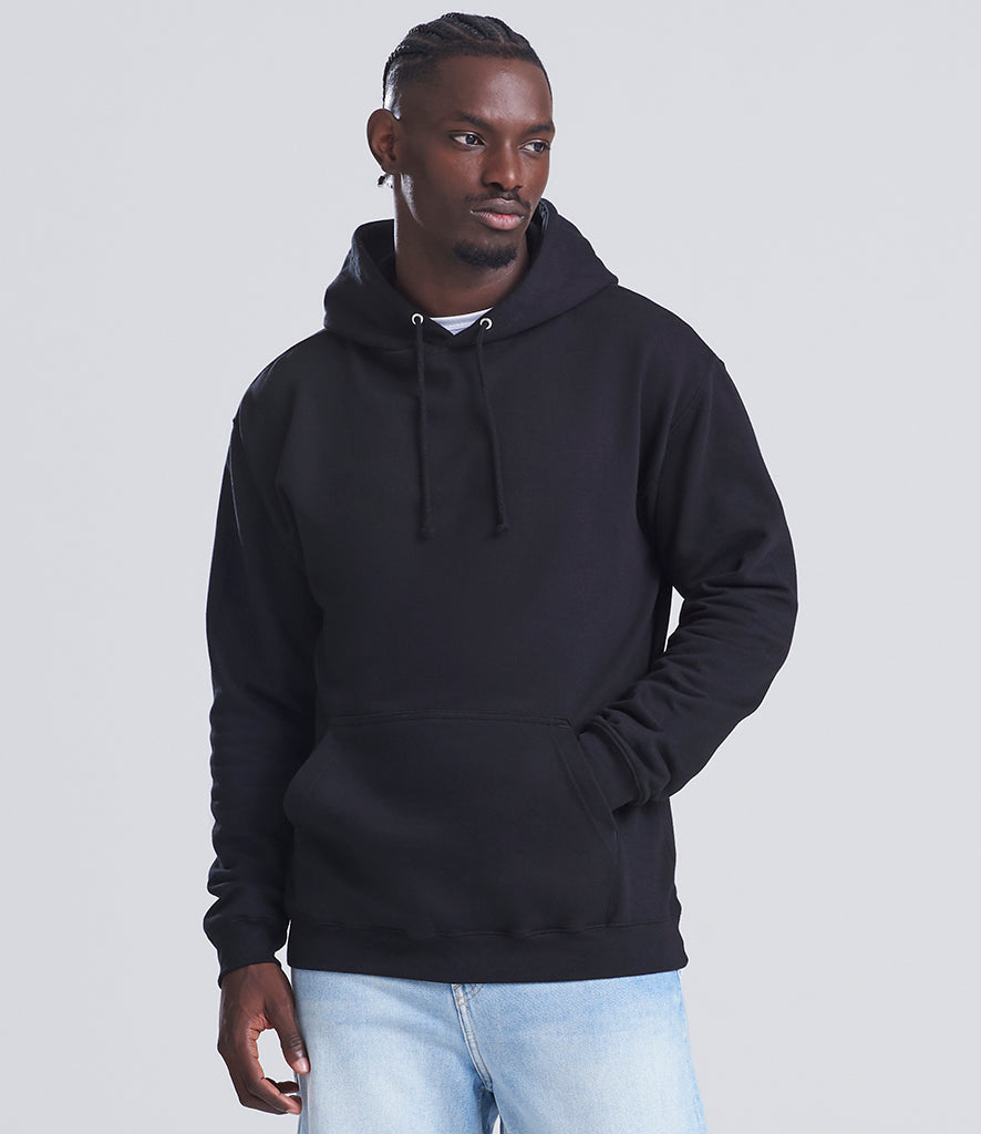 man wearing a black hoodie looking at the camera