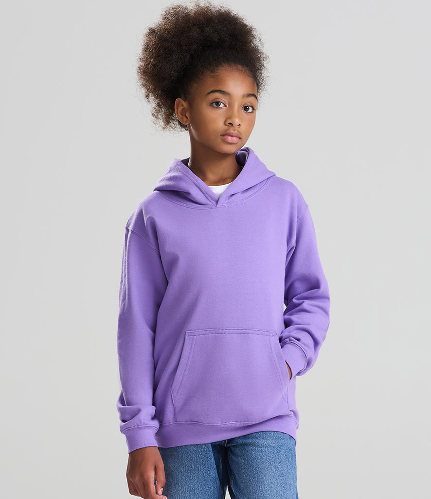 child wearing a lilac hoodie facing the camera