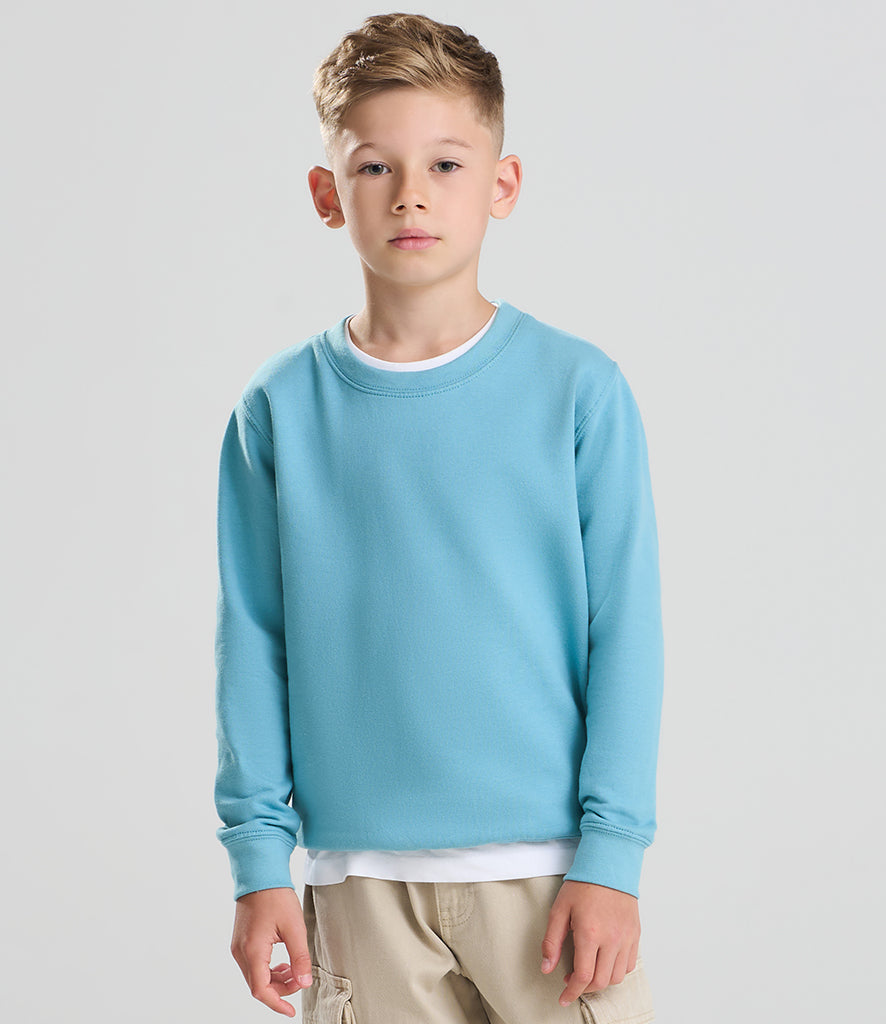 child wearing a bright-blue sweatshirt facing the camera