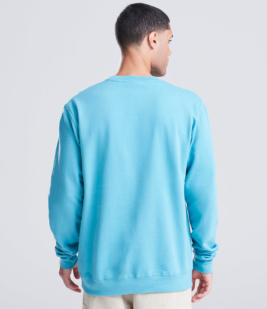 man wearing a blue sweatshirt looking away from the camera